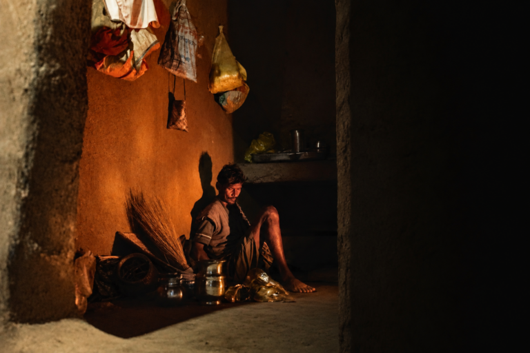 A older man sit in the traditional home